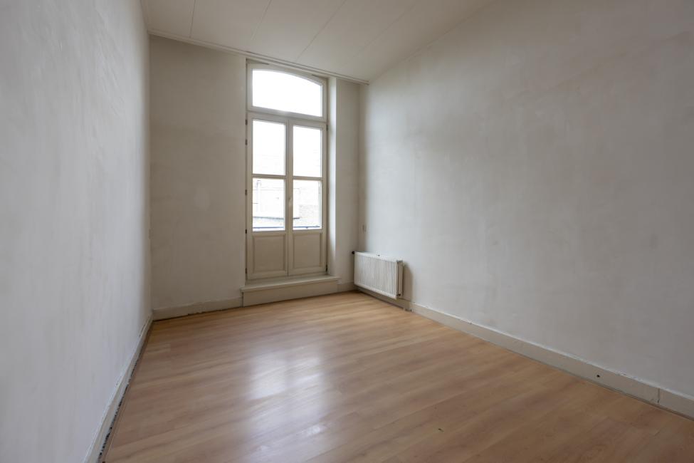 Slaapkamer met deur naar terras